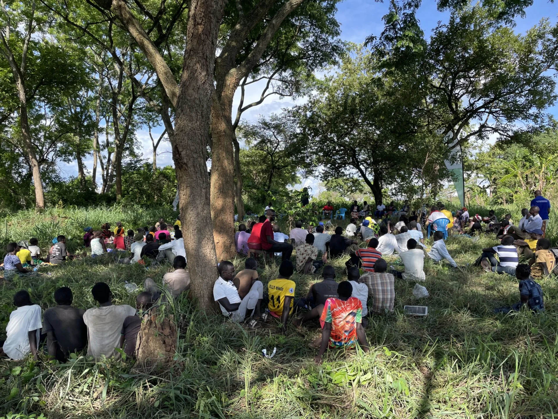 Researchers engaging local communities in Africa for climate change and environmental justice research.