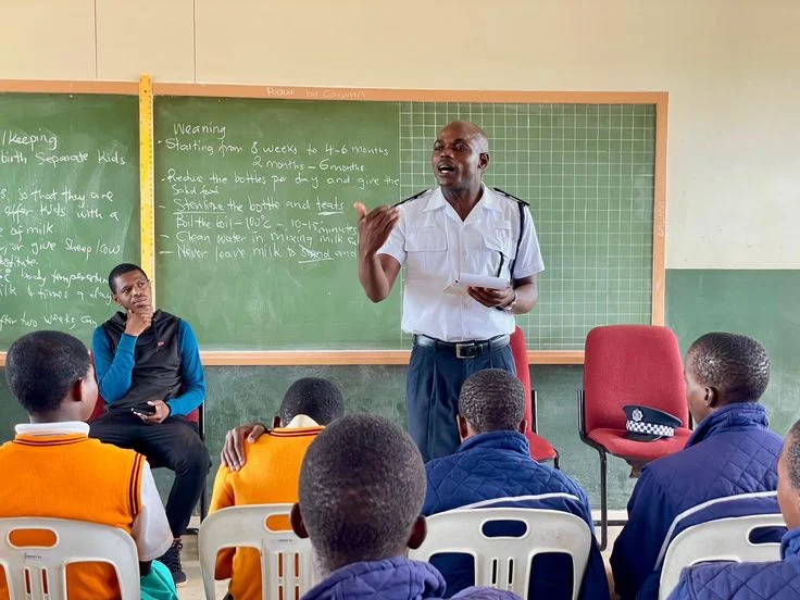 Researcher conducting culturally respectful social research in a community setting.