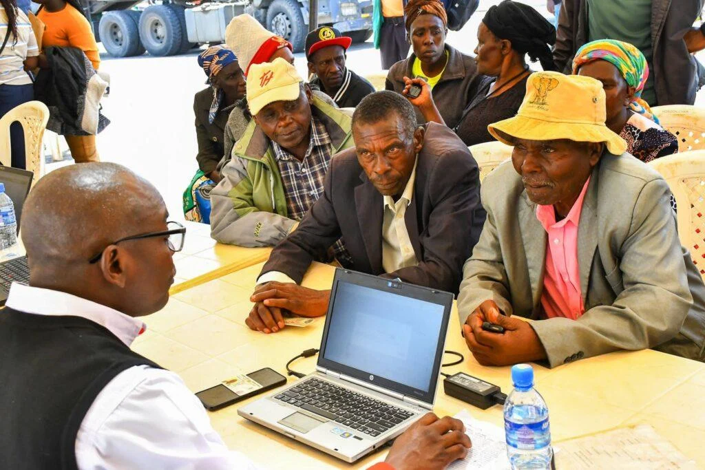 African citizens participating in a community discussion about governance, public institutions and corruption.